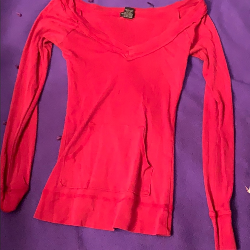 Red v-neck long sleeved shirt